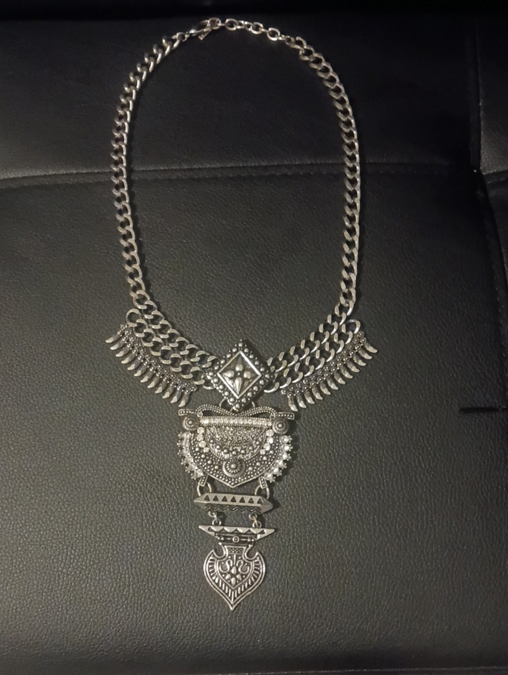 Ornate Silver-Tone Statement Necklace with Layered Tribal Pendant